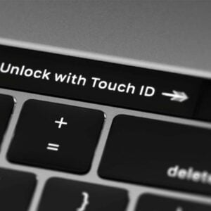 Macbook som väntar på upplåsning med Touch-ID.