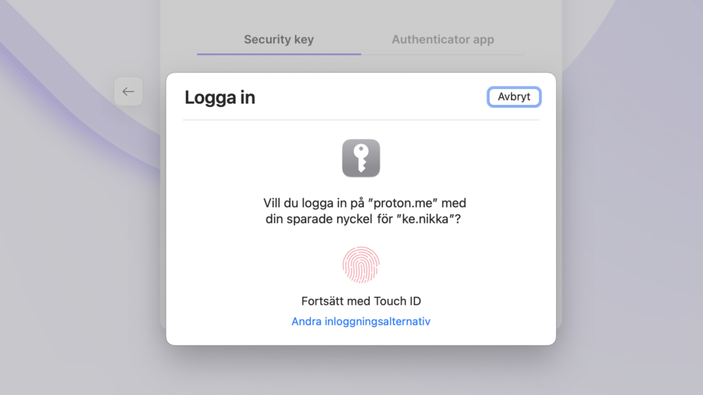 Safari på Mac OS ber användaren lägga fingret på Touch-ID-sensorn och skriver: vill du logga in på proton.me med din sparade nyckel för ke.nikka?