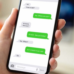 En Iphone visar gröna chattbubblor.