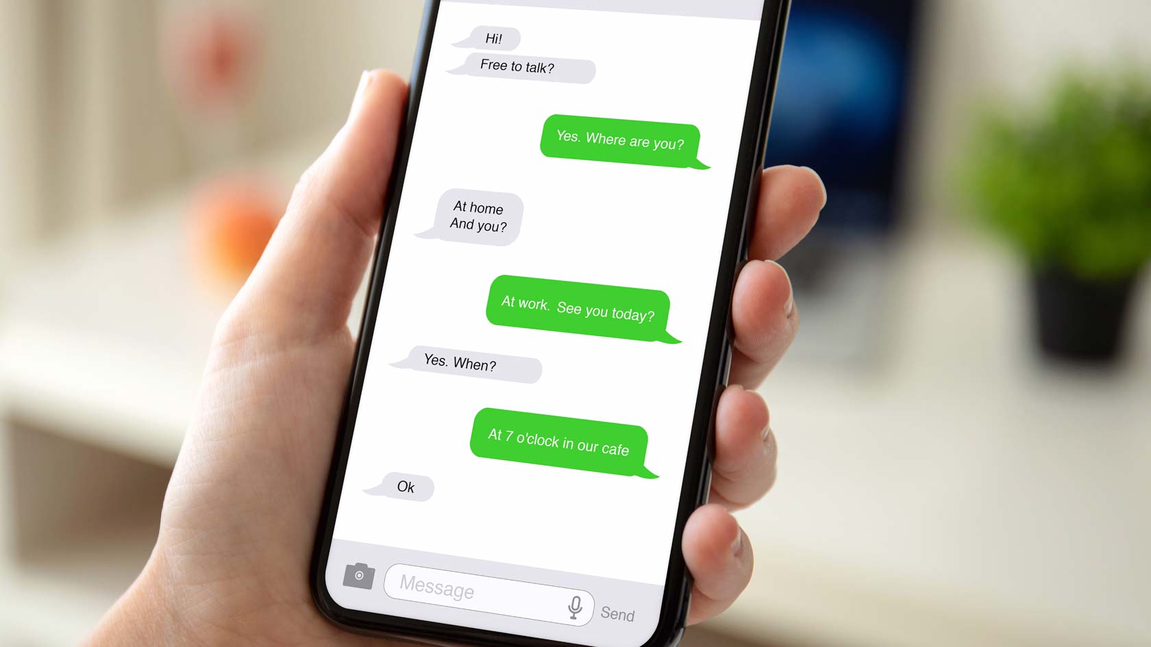 En Iphone visar gröna chattbubblor.