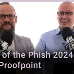 Michael Järpenge från Proofpoint och Karl Emil Nikka står vid varsin mikrofon. Texten ”State of the Phish 2024 med Proofpoint” är stämplad ovanpå.